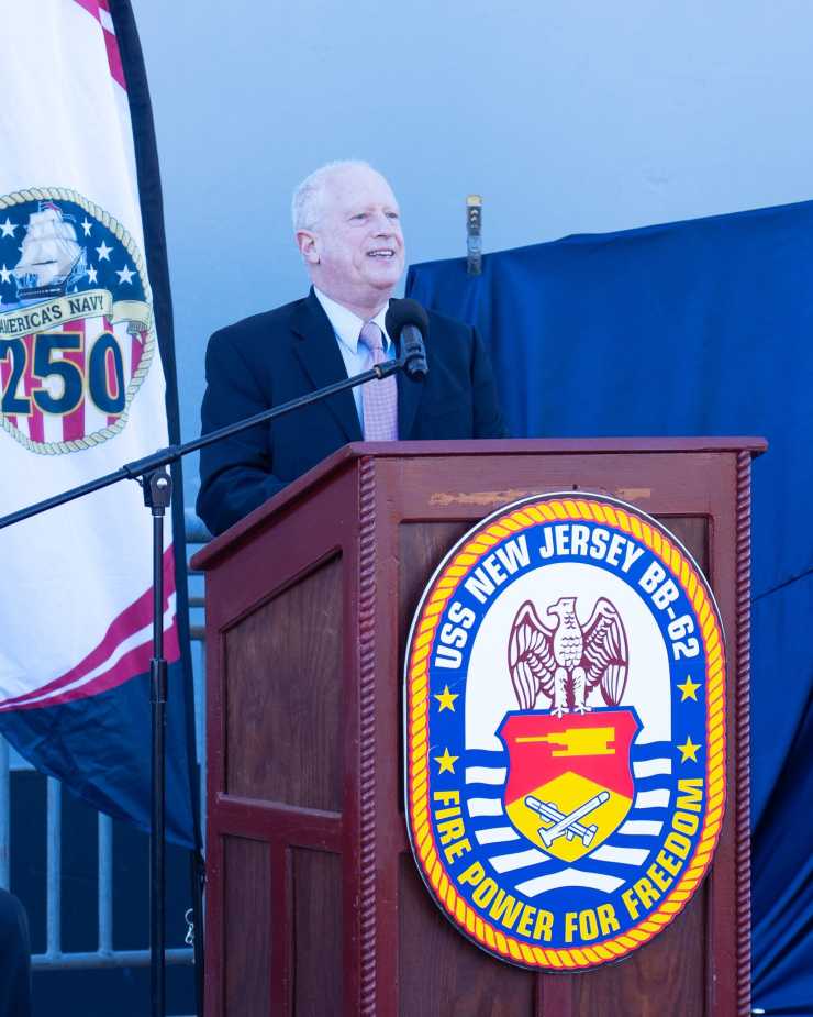 Mayor Mark Bromberg of Rivervale Township, New Jersey, speaks at USS Enterprise stern plate unveiling ceremony at Battleship New Jersey during Navy 250th anniversary celebration on October 10, 2025.