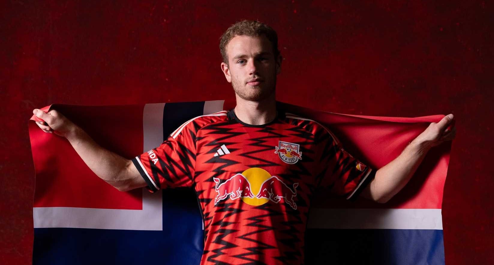 Dennis Gjengaar with a flag of Norway. Mandatory Credit: New York Red Bulls