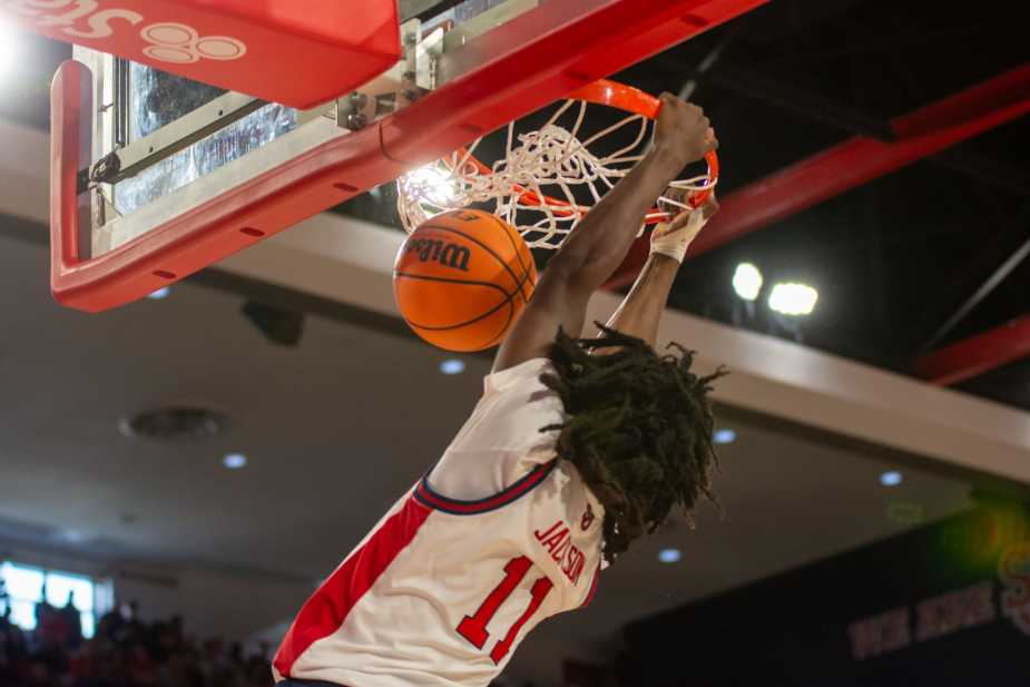 St. John's Red Storm forward Dillon Mitchell dunks the basketball during the second-half comeback against Towson at Carnesecca Arena. Mitchell's aggressive play and versatility were key to St. John's' dominant 73-63 exhibition victory.