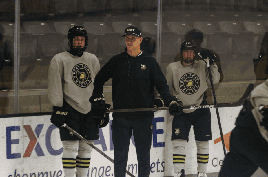 Zach McKelvie coaching his Army Black Knights in practice.