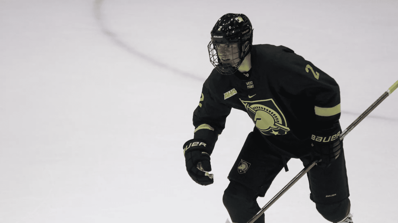 Freshman defenseman Lukas McCloskey celebrates scores his first collegiate goal for Army hockey; photo credit: Army Athletics