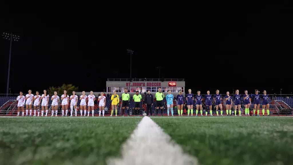 St. John's University women's soccer team starting eleven players pose together on the field before their 2-0 Senior Night victory over DePaul at Cox Family Field at Belson Stadium on October 25, 2025