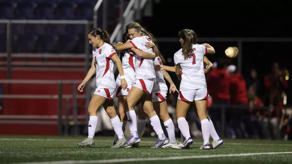 Hope Van Tuyle celebrates with St. John's teammates after scoring game-tying goal against Butler in 74th minute at Belson Stadium on October 22, 2025