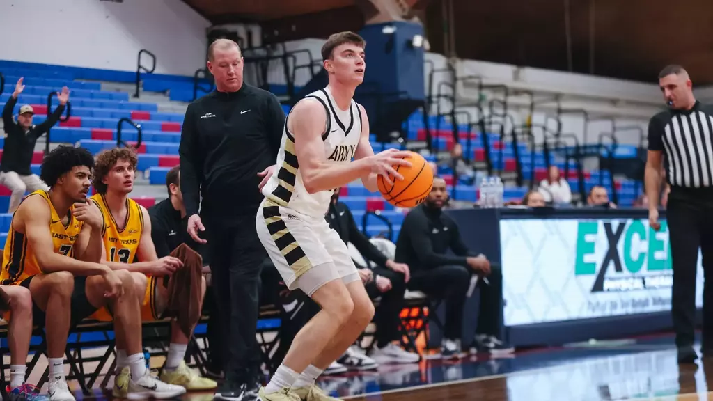 Army West Point men's basketball players celebrate together on court after victory at FDU Thanksgiving Classic, Bogota Savings Bank Center, November 2025