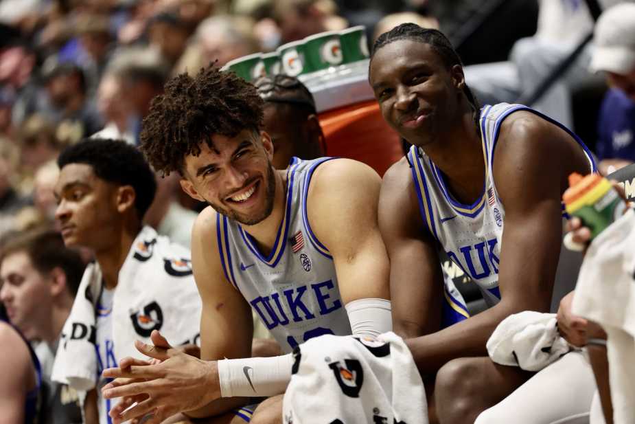 11/08/25, West Point , New York , Christl Arena, Cameron Boozer #12 of Duke shares a laugh with his teammate on the bench during the Army vs. Duke matchup. Mandatory Credit: Bad Dawg Sports/Jose Pichirilo
