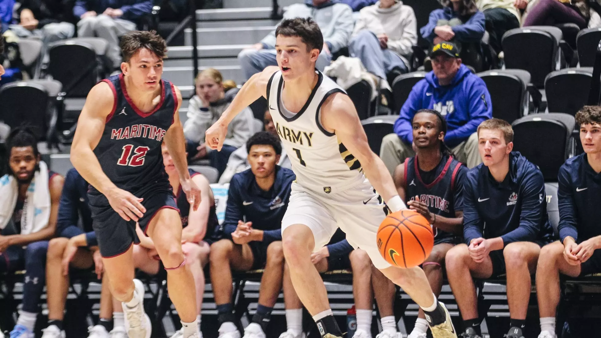 Army West Point freshman guard Jackson Furman dribbles the basketball up the court during the Black Knights' 73-49 season-opening victory over SUNY Maritime at Christl Arena on November 3, 2025