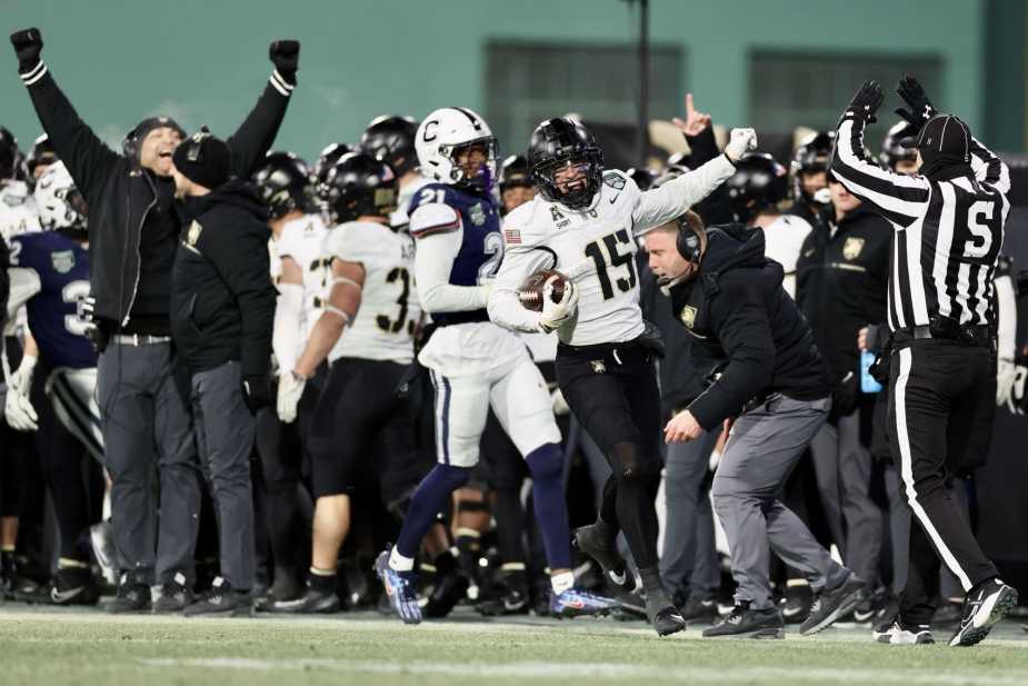 12/27/25, Boston, Massachusetts , Fenway, (#15)Noah Short of the Army Black Knights celebrates after becoming the first player in Army history to record over 1,000 rushing yards and 1,000 receiving yards in a career during the Wasabi Fenway Bowl 12/27/25, Boston, Massachusetts , Fenway Park. (#7) Godspower Nwawuihe of the Army Black Knights runs for a 43-yard touchdown during the first half of the Wasabi Fenway Bowl Mandatory Credit: Jose Pichirilo / Bad Dawg Sports