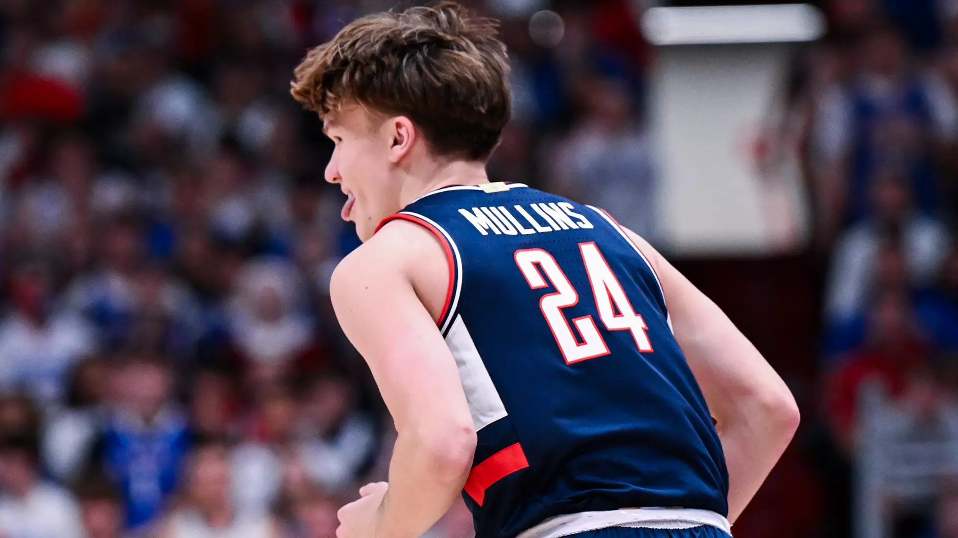 UConn Huskies freshman Braylon Mullins celebrates during 61-56 road victory over Kansas at Allen Fieldhouse on December 2, 2025