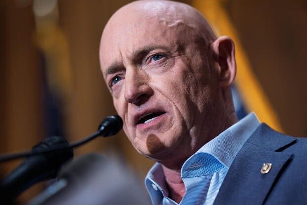 Sen. Mark Kelly, D-Ariz., speaks at a news conference at the Capitol, addressing efforts by President Trump and Defense Secretary Hegseth to intimidate lawmakers, December 1, 2025. AP Photo/J. Scott Applewhite