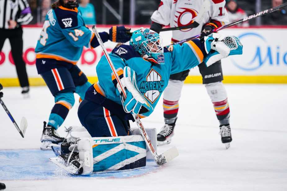 New York Sirens goaltender Callie Shanahan stretches across the crease to make a late third-period save against the Ottawa Charge at Prudential Center. Mandatory Credit: PWHL/ Ashley McLellan.