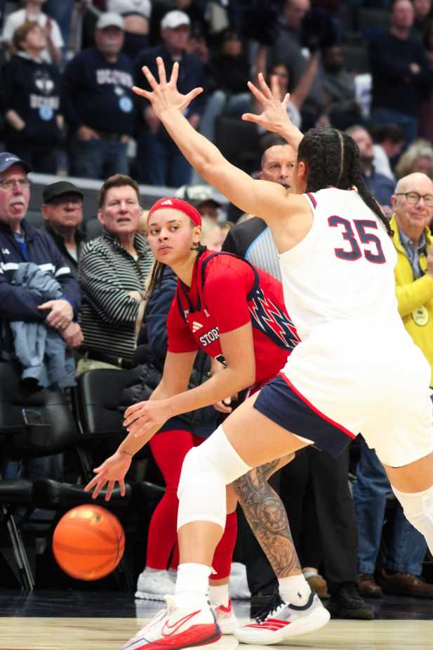 St. John’s Shaulana Wagner (#8) is pressured by UConn’s Azzi Fudd (#35) along the sideline during a women’s basketball game.