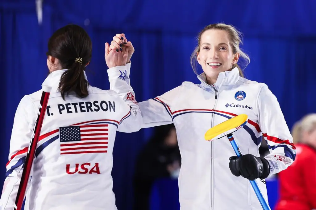 2/14/2026 Olympic curling Arena, Cortina bay, Italy, Tabitha Peterson and Taylor Anderson-Heide Celebrates the win. Mandatory credit: World Curling.