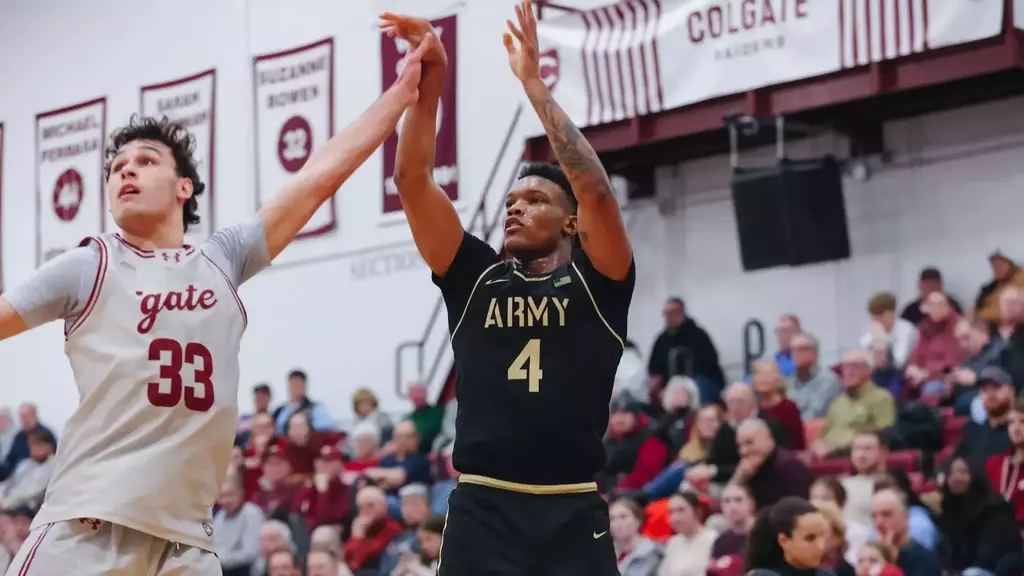 Army West Point guard Jaxson Bell rises for a three-point shot against Colgate at Cotterell Court in Hamilton, N.Y.
