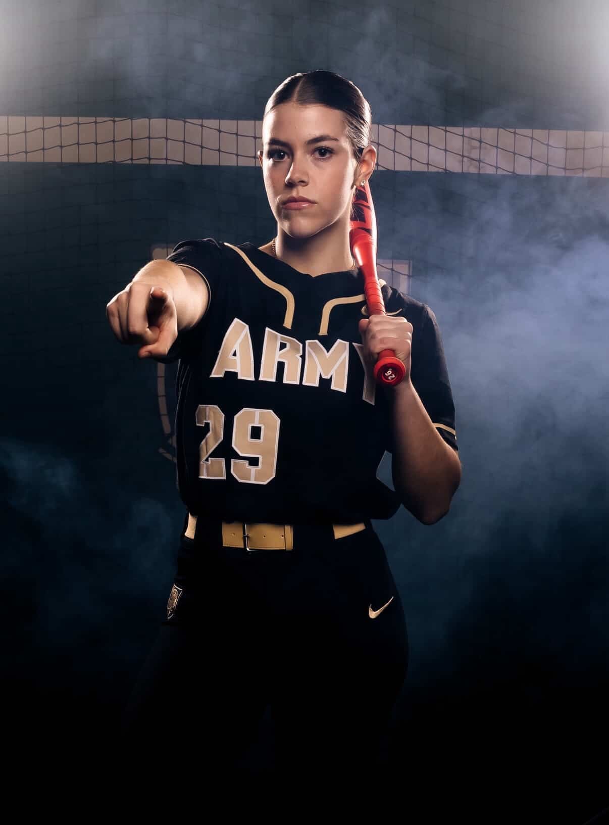 Army softball freshman infielder Alexis Osterhaus fields a ground ball in a ready stance