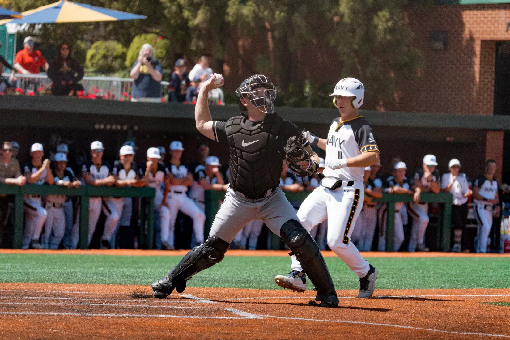 Army West Point catcher Jack Quinlan (Sayville, N.Y.) throws from behind home plate during a game.