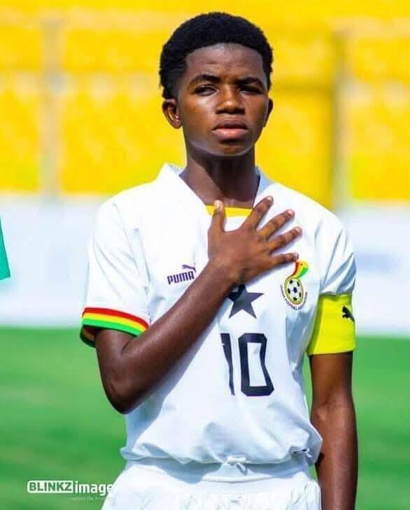 Stella Nyamekye stands with the Dreamz Ladies FC starting XI before kickoff in Ghana.