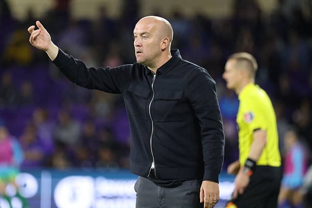 Denver Summit FC head coach Nick Cushing gestures from the sideline during the match against the Orlando Pride at Inter&Co Stadium.