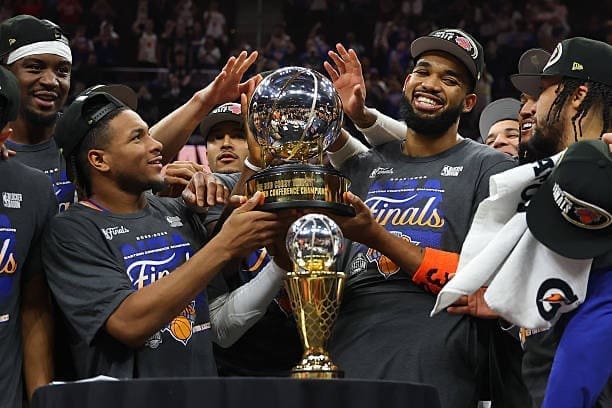 The Knicks hold the trophy