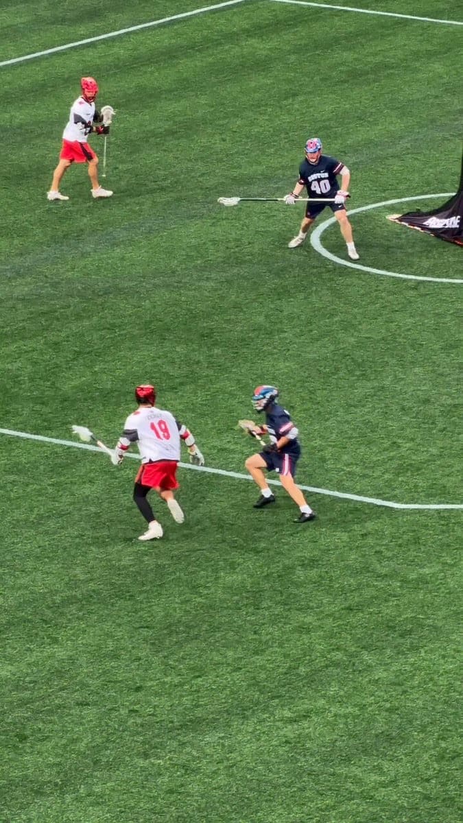 Jackson Eicher wearing his white Carolina Coas jersey took on the Boston Cannons and scored a hat trick.
