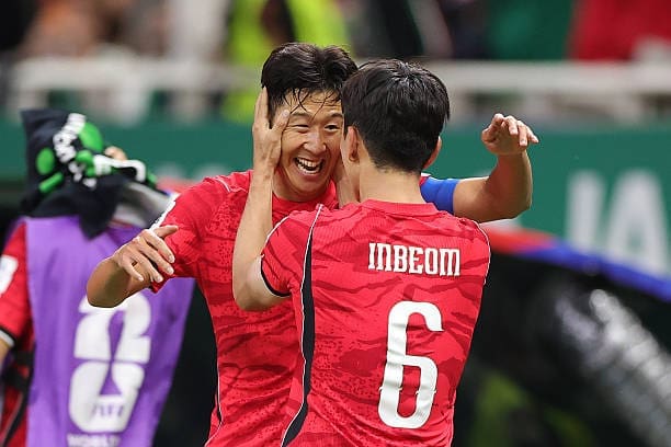Beom Hwang #6 of Korea Republic celebrates scoring his team's first goal with Heung-Min Son #7 during the FIFA World Cup 2026