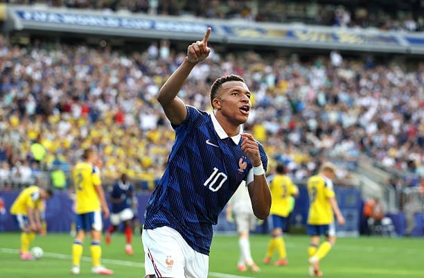 Kylian Mbappe smashes it home