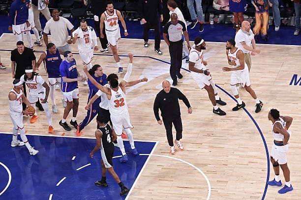 A celebration at the Knicks Bench