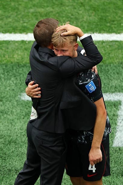 Jesse Marsch hugs his man