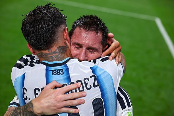 Enzo Fernandez and Lionel Messi Hug each other